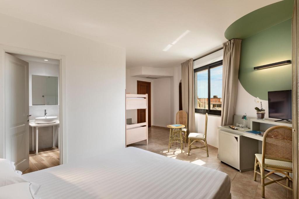 Postel nebo postele na pokoji v ubytování Rina Hotel