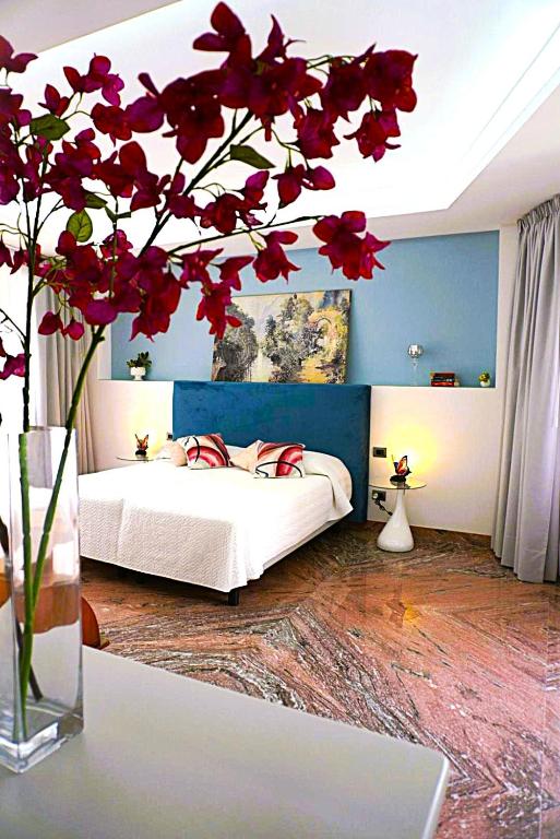 Postel nebo postele na pokoji v ubytování B&B Midtown Sorrento Excellence