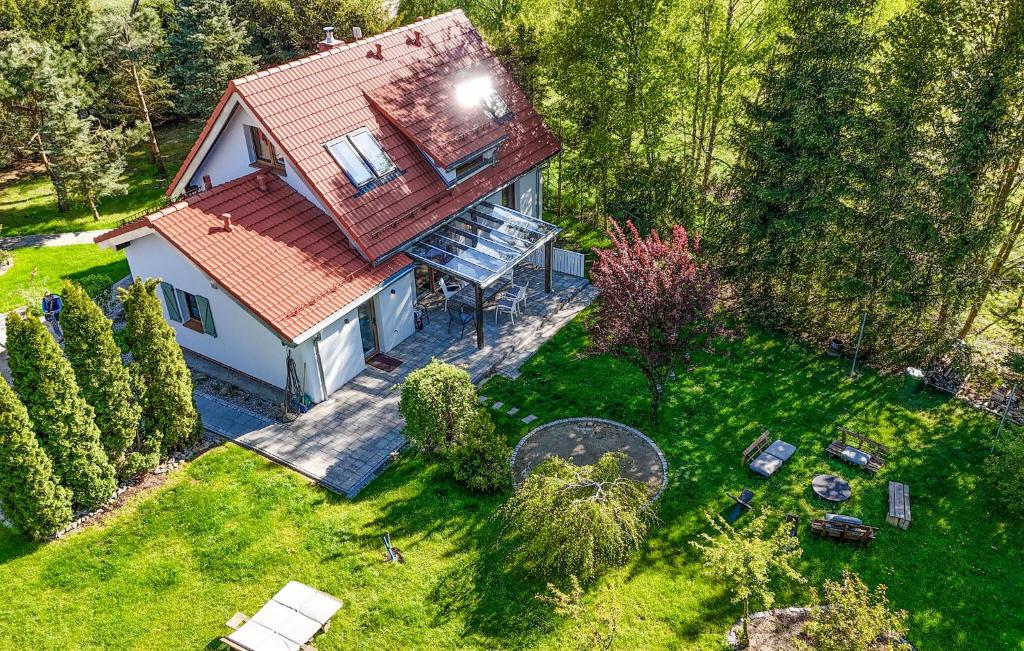 an overhead view of a house with a yard at Beautiful Home In Podwilczyn With Sauna in Dębnica Kaszubska