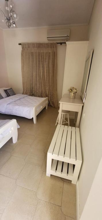 A bed or beds in a room at Margarita rooms