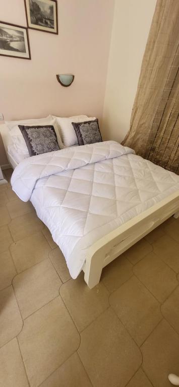 A bed or beds in a room at Margarita rooms