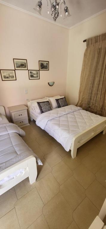 A bed or beds in a room at Margarita rooms