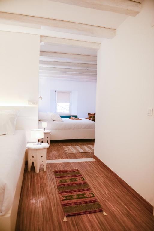 Postel nebo postele na pokoji v ubytování Hotel Old Sarajevo