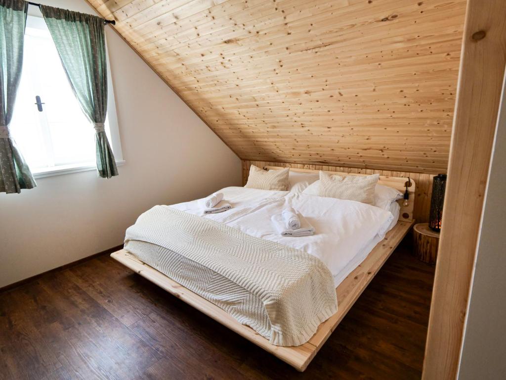 Letto o letti in una camera di Roubenka Meandra