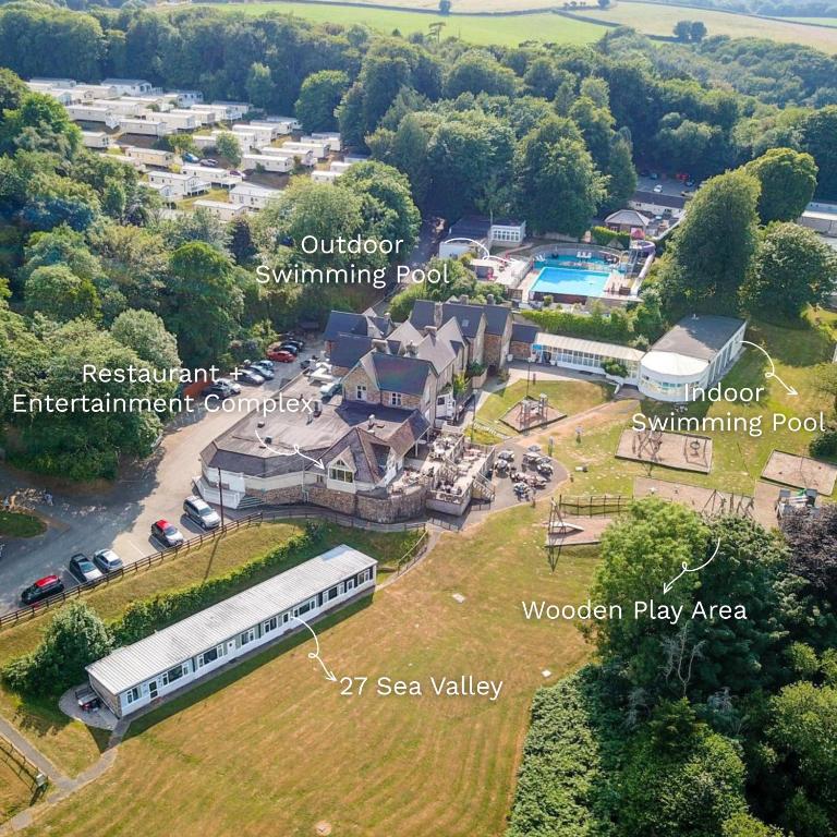 an aerial view of a large house with a swimming pool at 27 Sea Valley Chalet in Bucks Mills