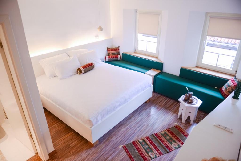 Postel nebo postele na pokoji v ubytování Hotel Old Sarajevo