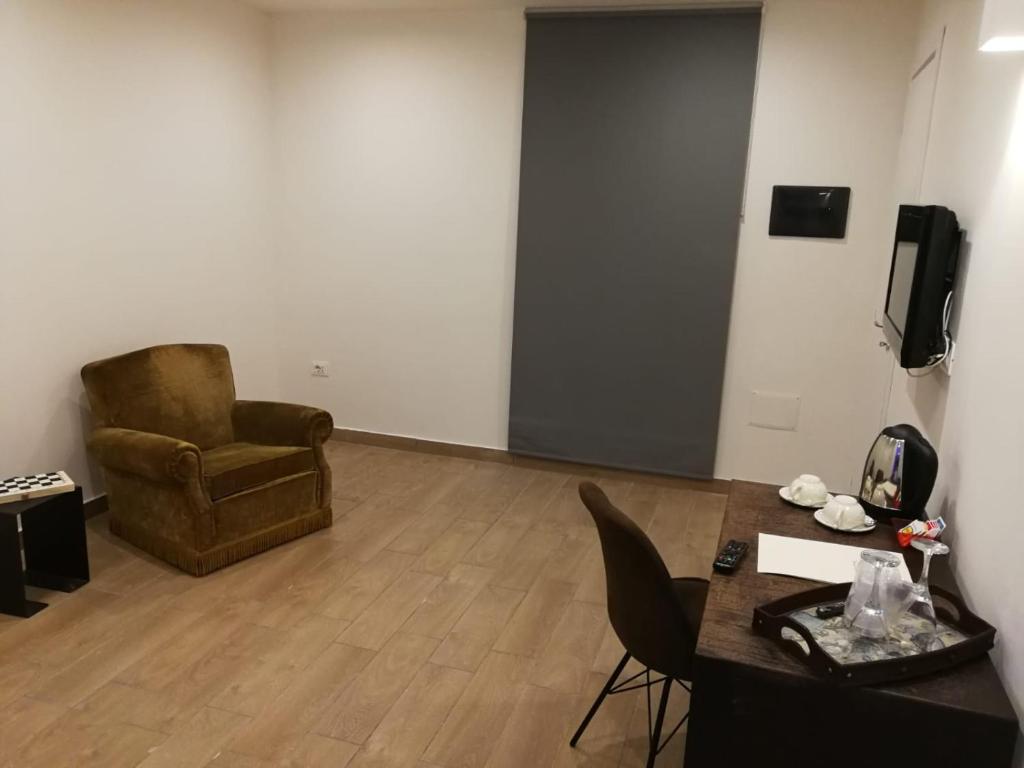 TV a/nebo společenská místnost v ubytování Hotel Assisivm Antica Dimora AD