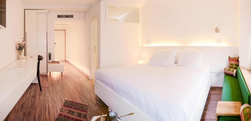 Postel nebo postele na pokoji v ubytování Hotel Old Sarajevo