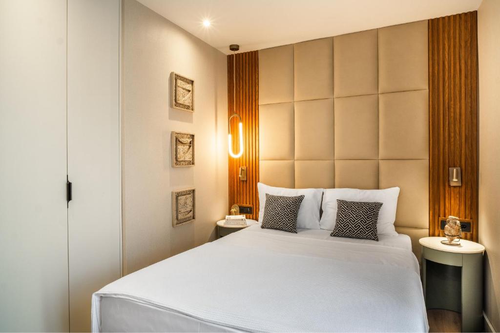 Postel nebo postele na pokoji v ubytování Boutique Hotel Villa Royal