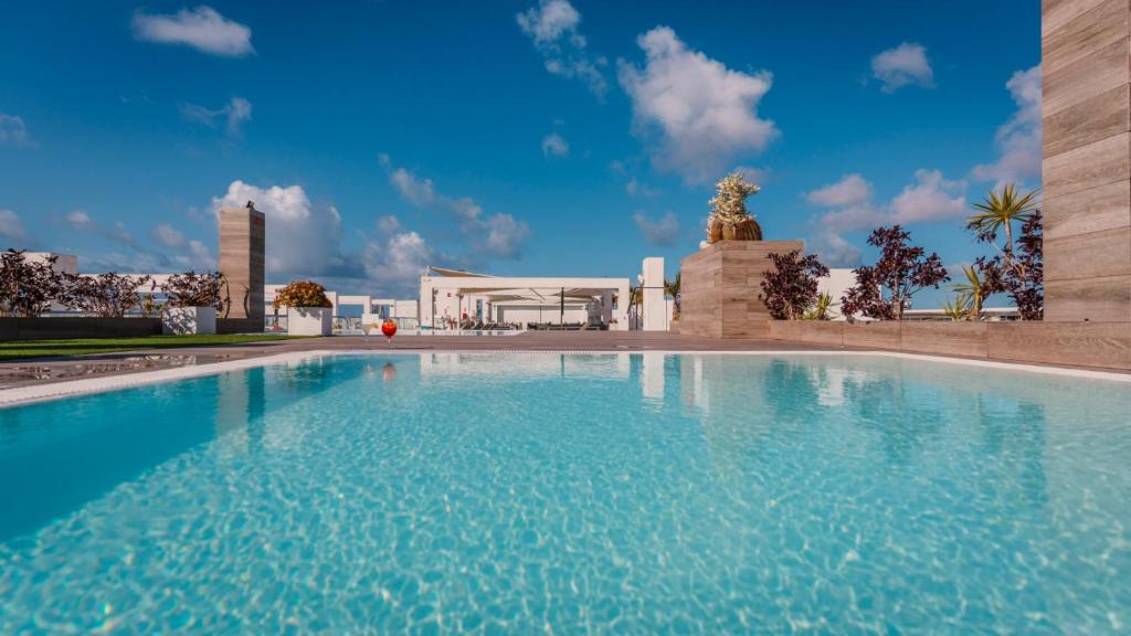 a large swimming pool in front of a building at Labranda Marieta & Spa - Adults Only in Playa del Ingles