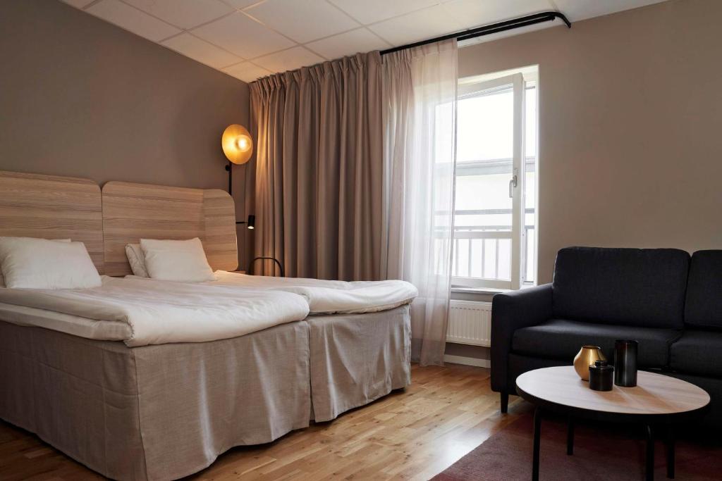 Postel nebo postele na pokoji v ubytování Scandic Visby