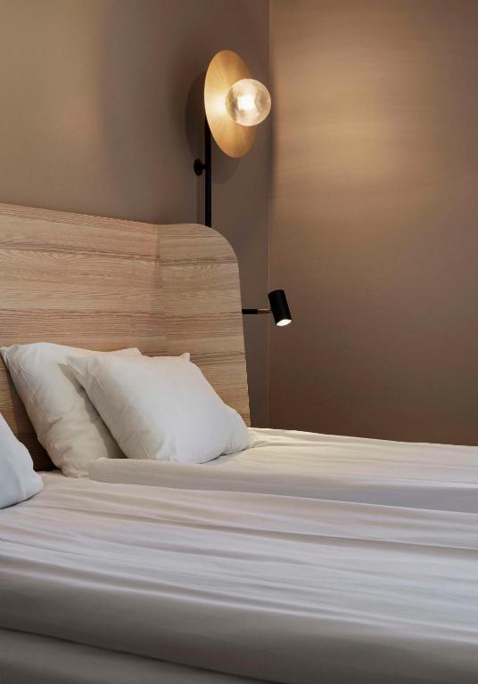 Postel nebo postele na pokoji v ubytování Scandic Visby