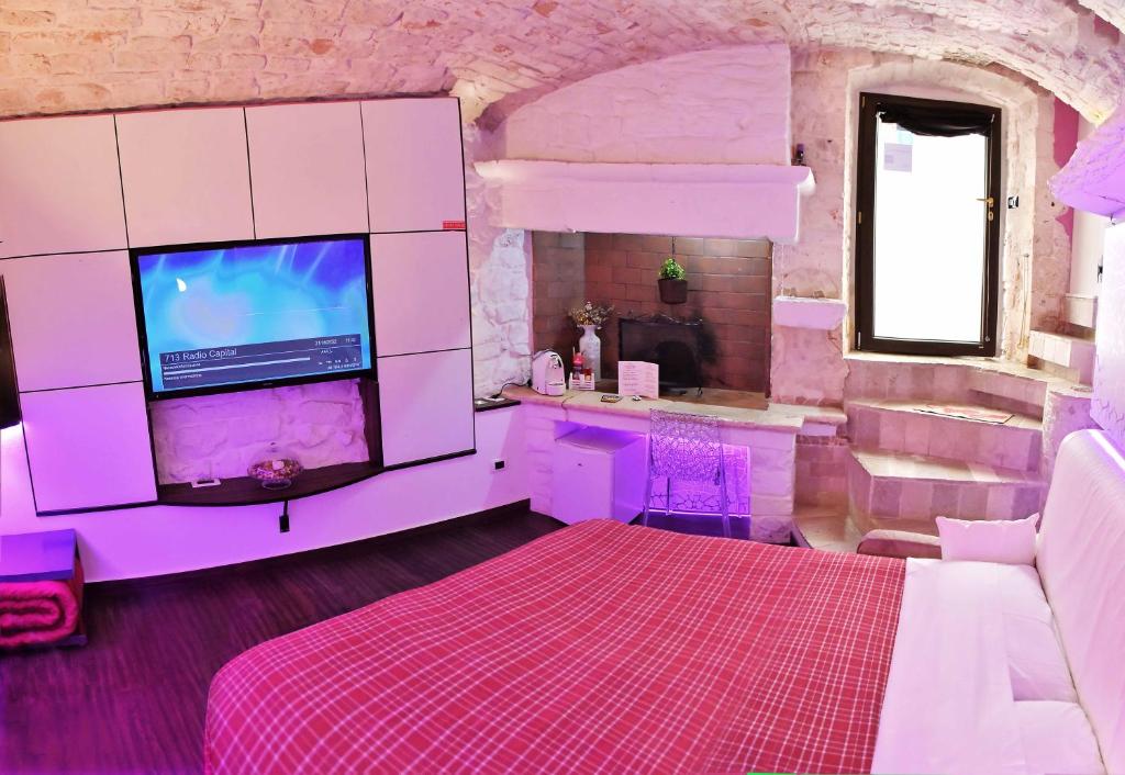 Łóżko lub łóżka w pokoju w obiekcie l'angolo di Gaudì, alcoba Capriccio