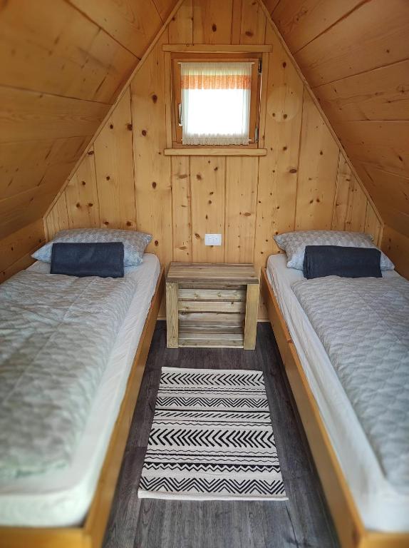 Postel nebo postele na pokoji v ubytování Village Vista