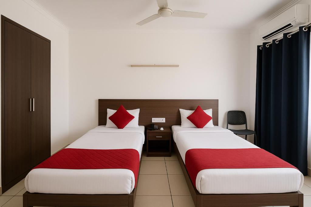 Postel nebo postele na pokoji v ubytování Wonderland Service Apartment Medanta