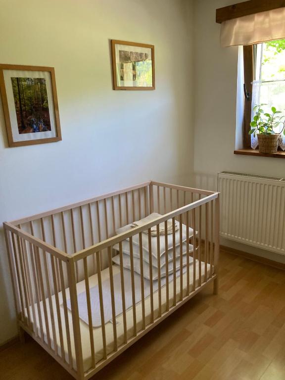 Postel nebo postele na pokoji v ubytování Tyllichova Chata