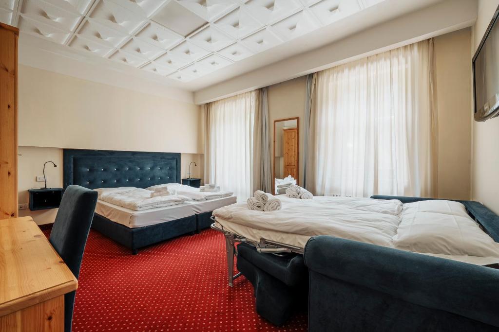 Postel nebo postele na pokoji v ubytování HOTEL AURONZO - outdoor basecamp