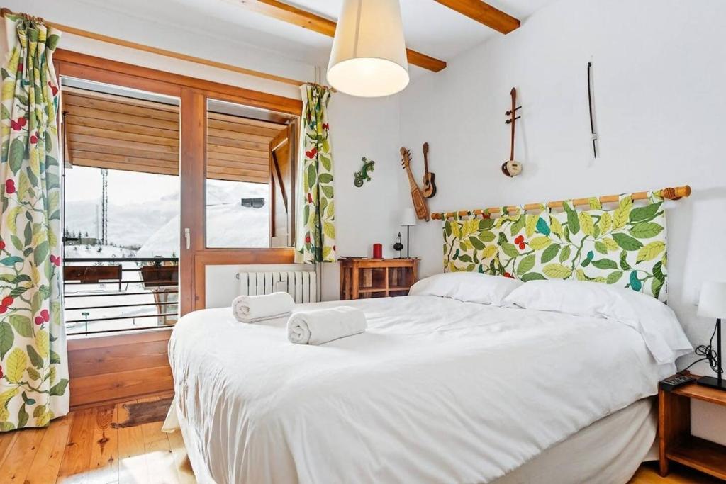 Postel nebo postele na pokoji v ubytování Austen Precioso chalet en Formigal