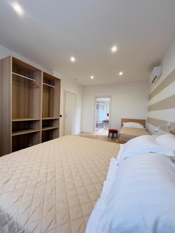 Postel nebo postele na pokoji v ubytování B&B Vigna21