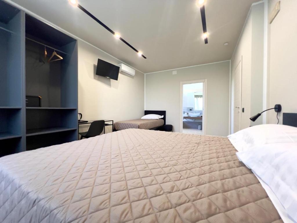 Postel nebo postele na pokoji v ubytování B&B Vigna21