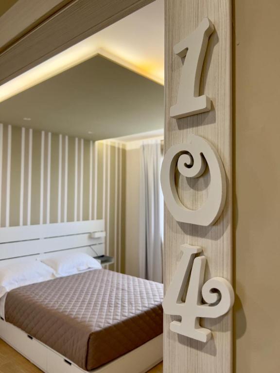 Postel nebo postele na pokoji v ubytování B&B Vigna21