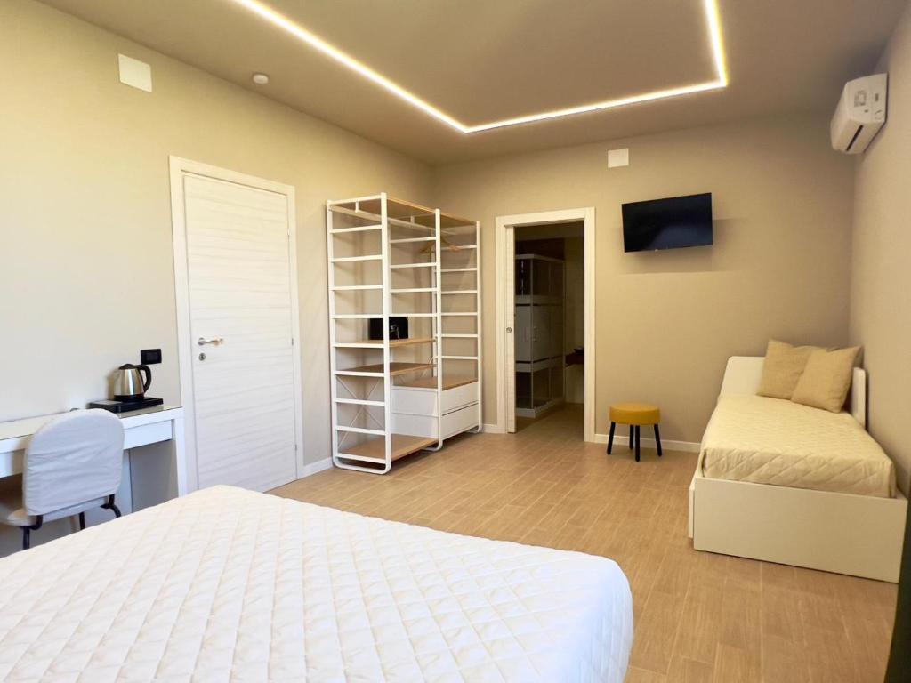 Postel nebo postele na pokoji v ubytování B&B Vigna21
