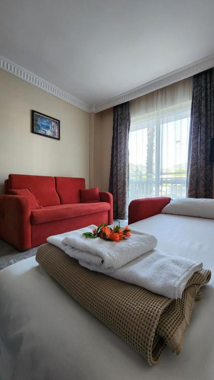 En eller flere senge i et værelse på Irem Apart Hotel