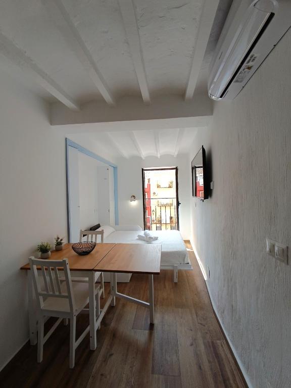 Ένα ή περισσότερα κρεβάτια σε δωμάτιο στο Godello - Harbor's Light