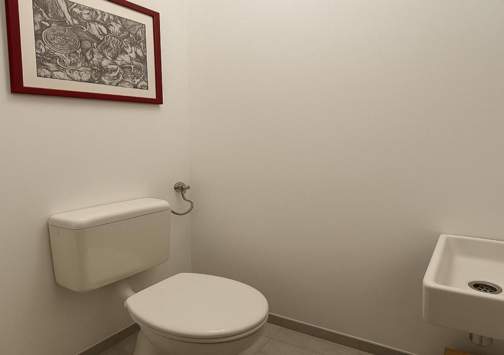 a bathroom with a white toilet and a sink at Dietzenbach Haus mit 5 Zimmern langfristig zu vermieten in Dietzenbach