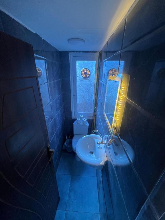 Koupelna v ubytování Downtown House Suites