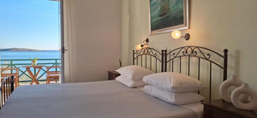 Postel nebo postele na pokoji v ubytování Brazzera Hotel