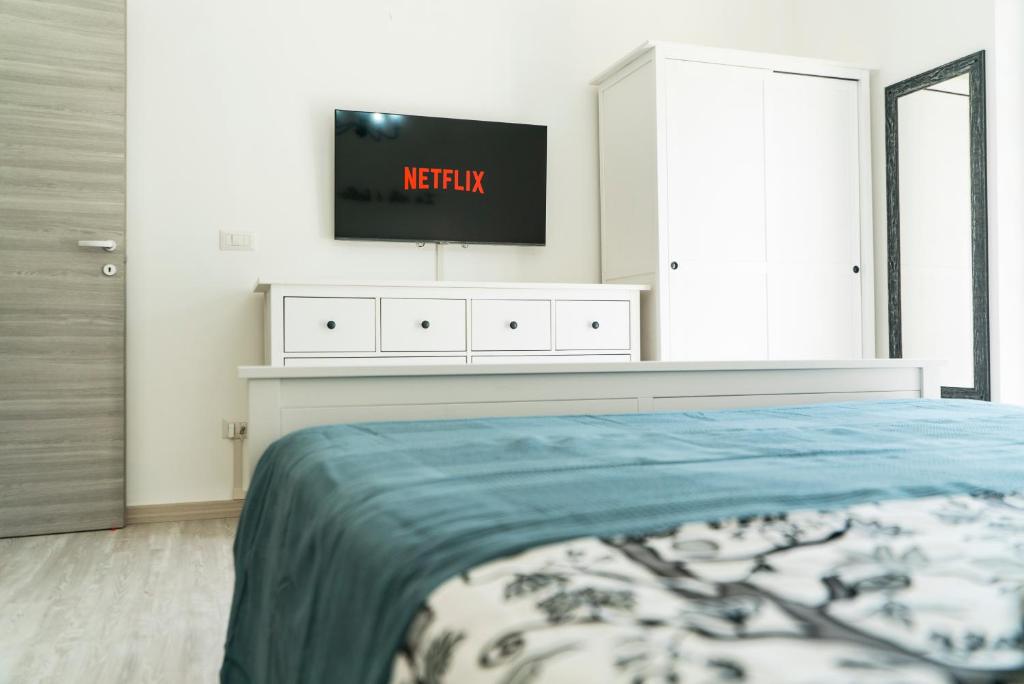 En eller flere senge i et værelse på Casa Mare View Wi-Fi AC