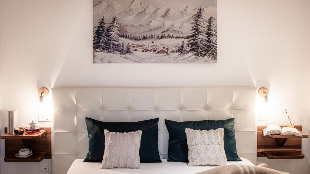 Postel nebo postele na pokoji v ubytování Albergo Reale