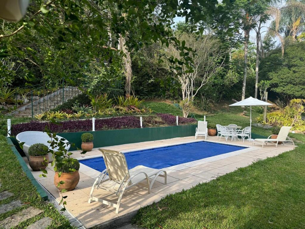 Bazén v ubytování Canto da Saíra Azul nebo v jeho okolí