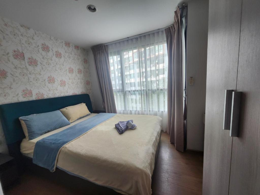Postel nebo postele na pokoji v ubytování 中央公寓 1bedroom Centrio 804 Condominium 211