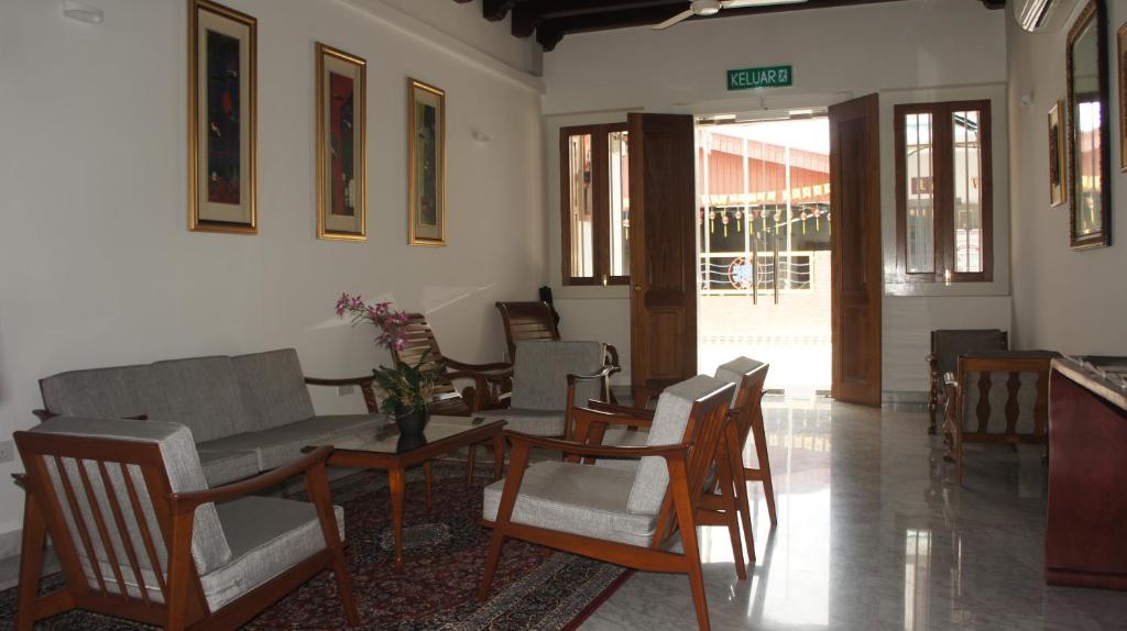 Posezení v ubytování Heeren Straits Hotel