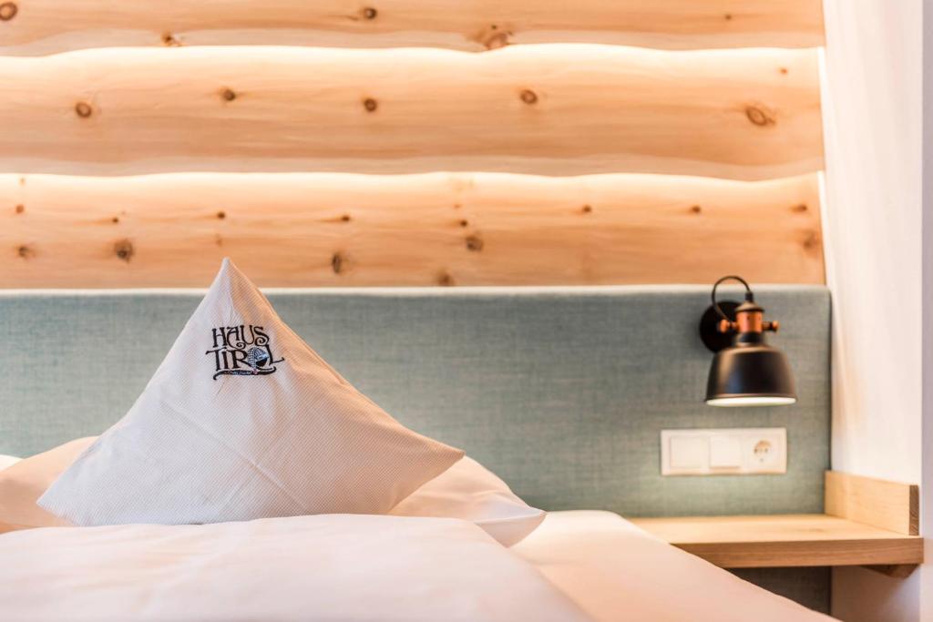Postel nebo postele na pokoji v ubytování Pension Haus Tirol