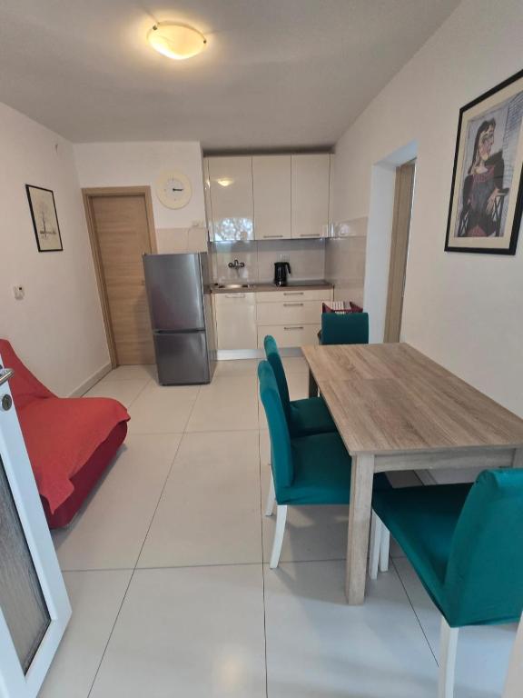 Kuchyňa alebo kuchynka v ubytovaní Apartments Sokolović