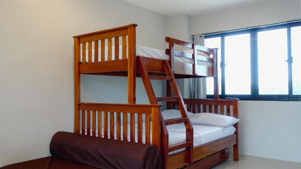 Postel nebo postele na pokoji v ubytování Sea Break La Union