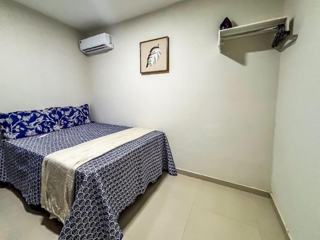 Uma cama ou camas num quarto em Vila Imper Host Balsas- Apês com Wi-fi I A/C a 3 min. do Mix Mateus