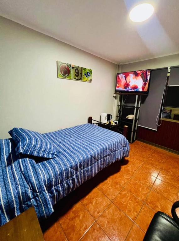 TV a/nebo společenská místnost v ubytování Casa Cavancha