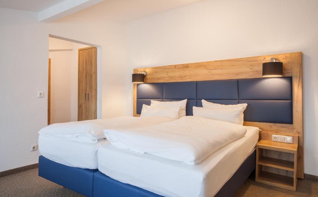 Postel nebo postele na pokoji v ubytování Sure Hotel by Best Western Wilhelmshaven City