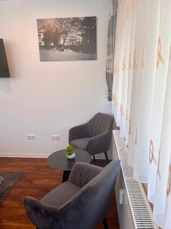 Posezení v ubytování Hotel am Schlossplatz