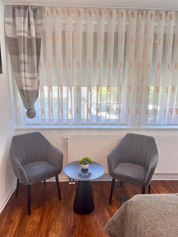Posezení v ubytování Hotel am Schlossplatz
