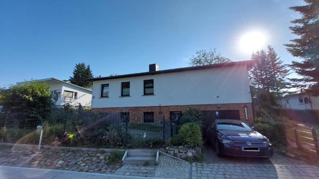 a car parked in front of a house at Ferienhaus David Nikola in Binz