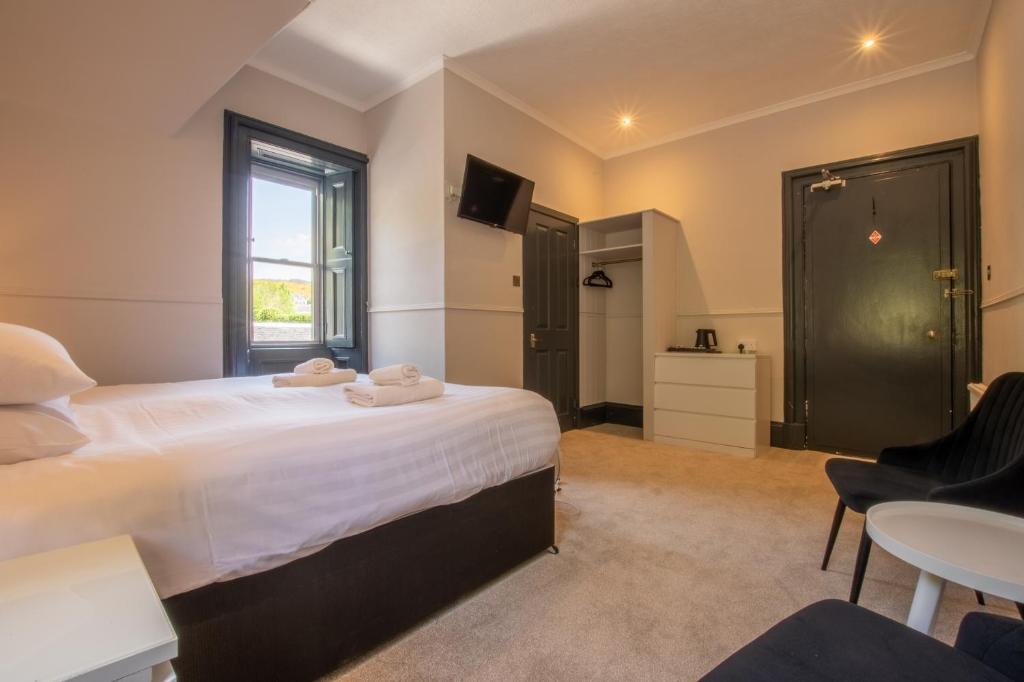 Postel nebo postele na pokoji v ubytování Dalrigh House