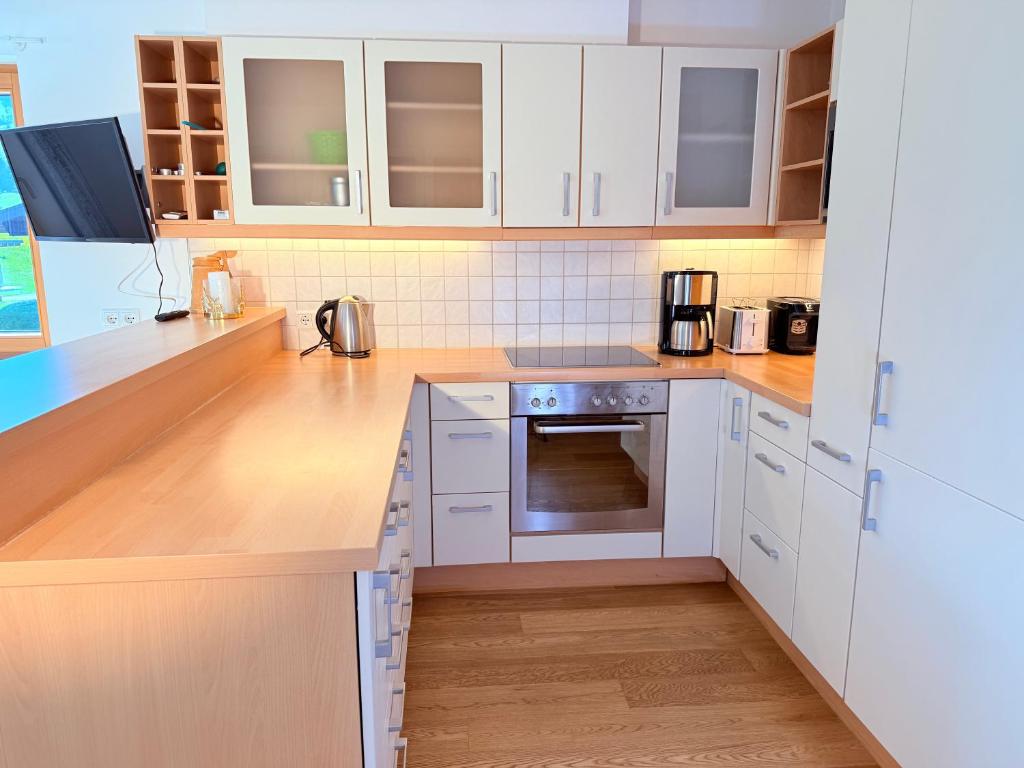 Kuchyň nebo kuchyňský kout v ubytování Wiesen Appartment