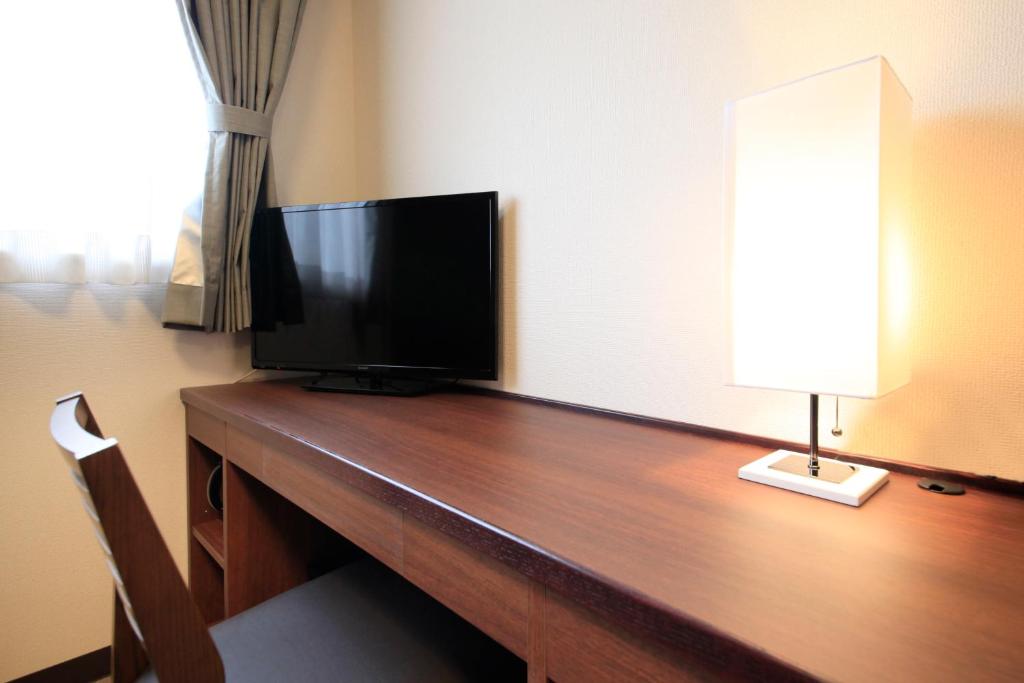 TV a/nebo společenská místnost v ubytování Hotel Togariishi