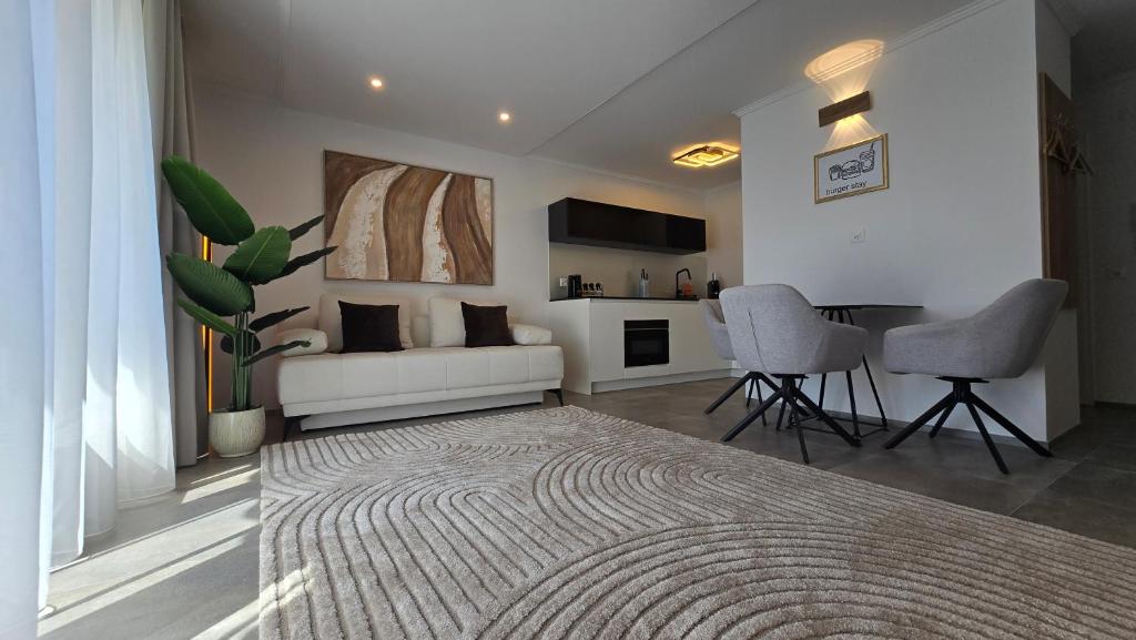 TV a/nebo společenská místnost v ubytování Apartment BugerStay