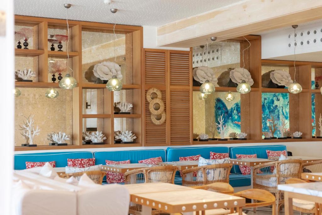 Ein Restaurant oder anderes Speiselokal in der Unterkunft Hotel Honucai 